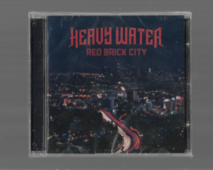 Heavy Water – Red Brick City – (projeto  do BIff  Byfford ( saxon) e seu filho Seb Byfford )